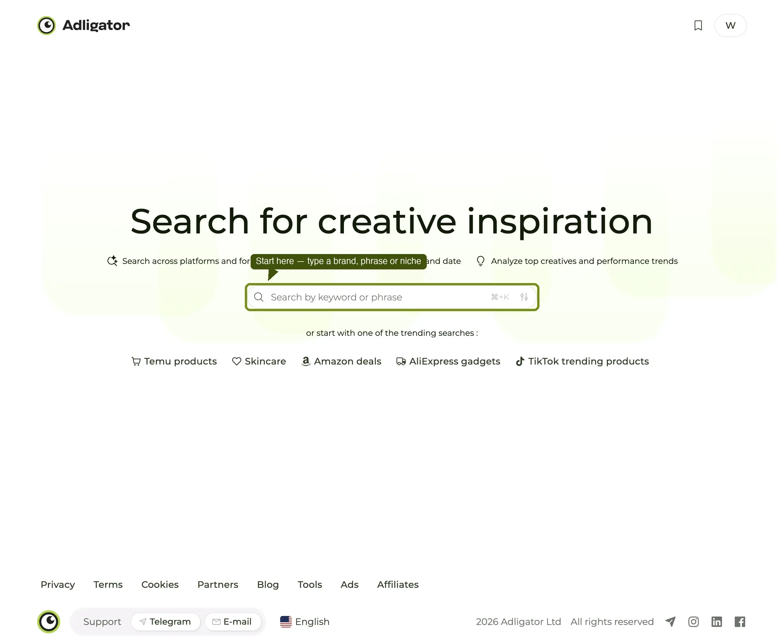 The Adligator Creatives tab landing page with the hero search bar highlighted.